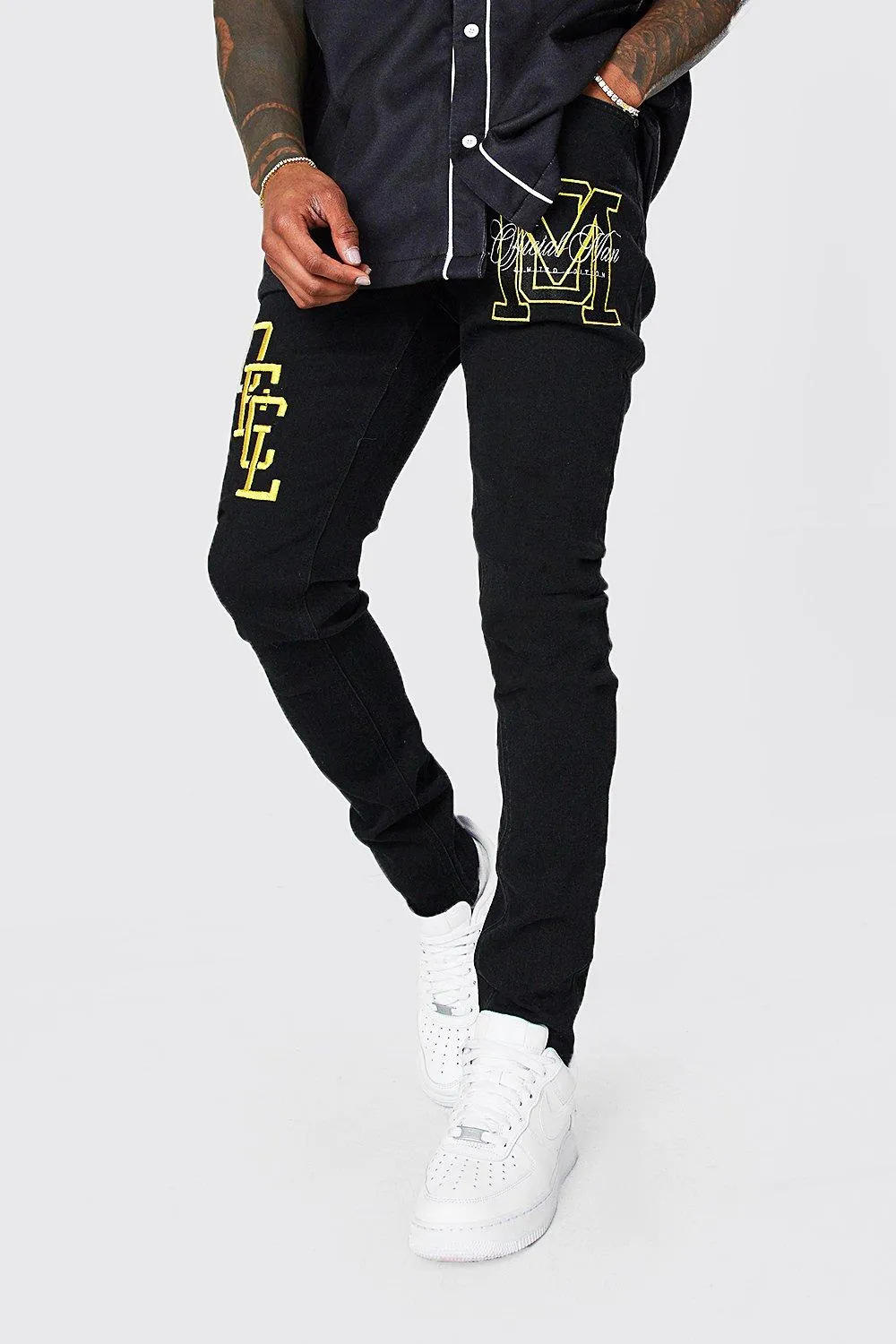 Skinny Stretch Ofcl Varsity Jeans | boohooMAN UK